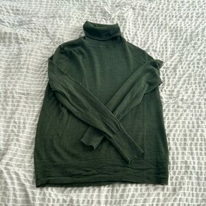 Green turtleneck sweater. Size medium.